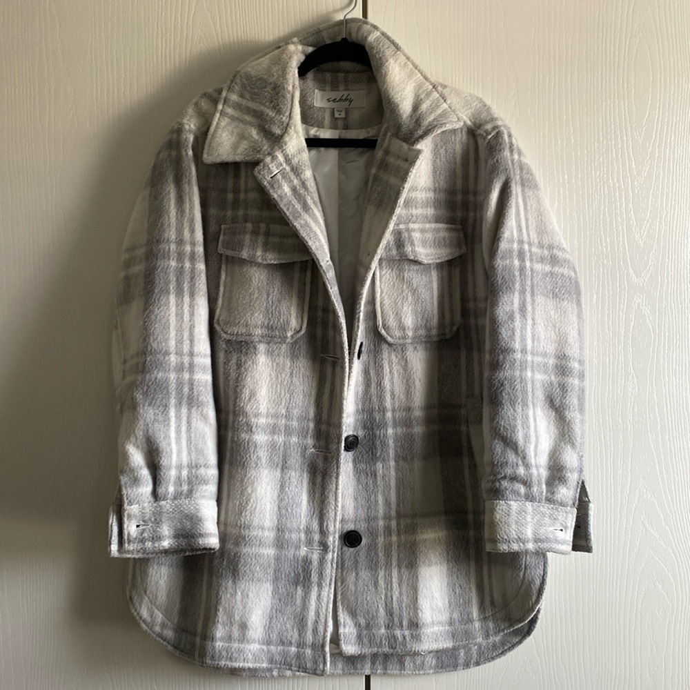 Plaid pattern jacket with inside is lined with a kind of soft silky fabric.